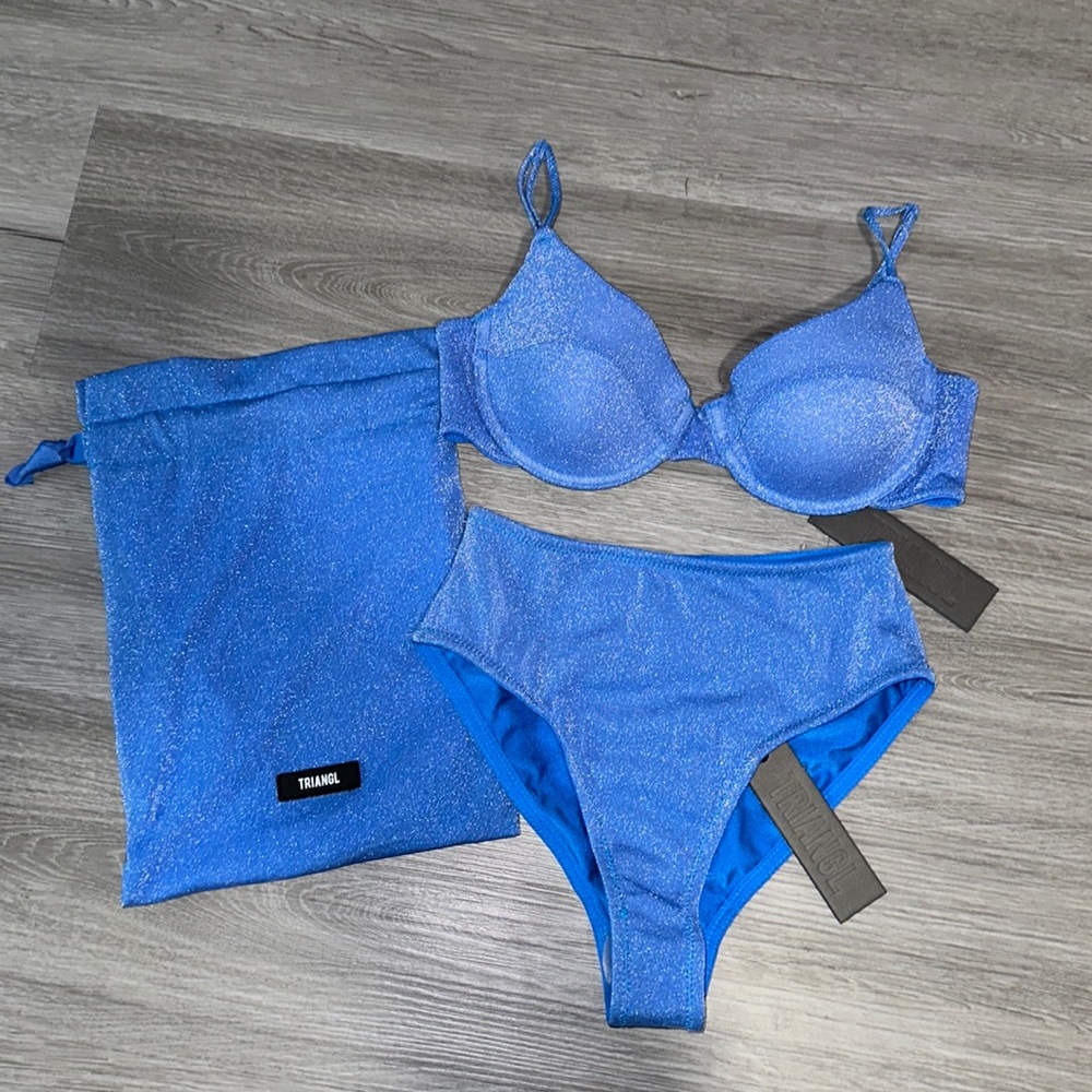 Blue sparkle swimsuit set with bag.